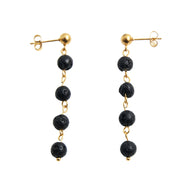 Pendientes de acero con baño de oro y bolas de lava volcánica